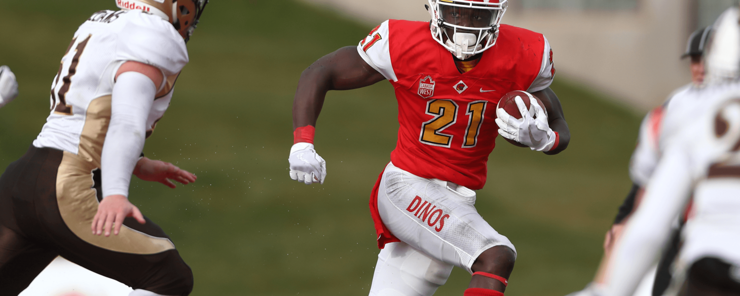 university of calgary dinos football player running