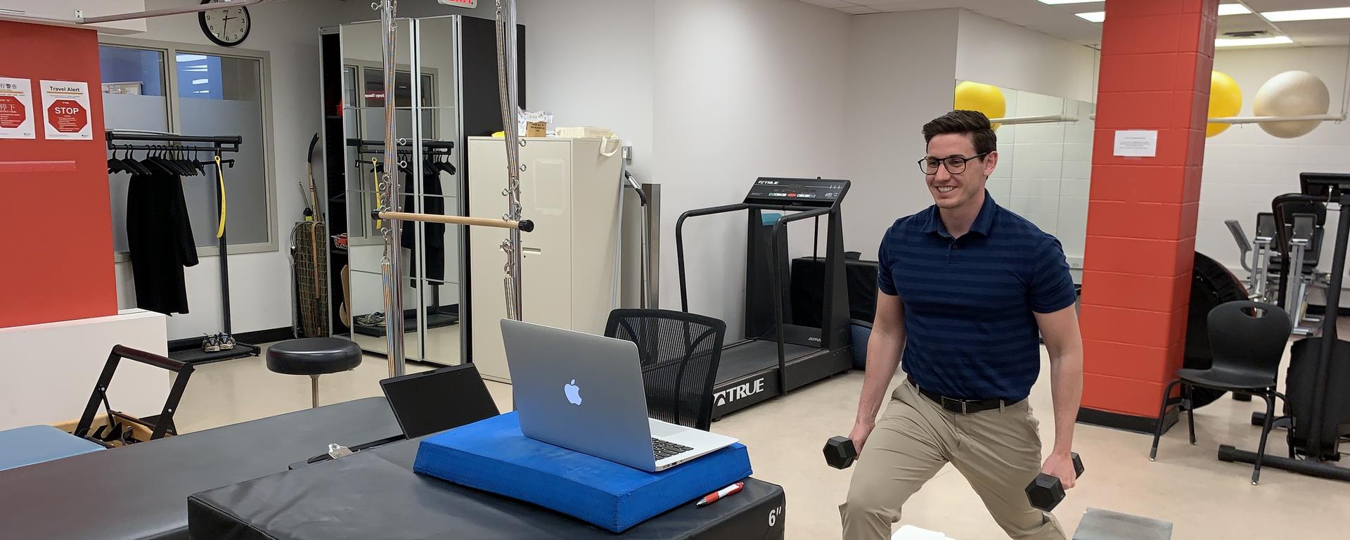 Physiotherapist Brett Henderson consulting with a client over Zoom