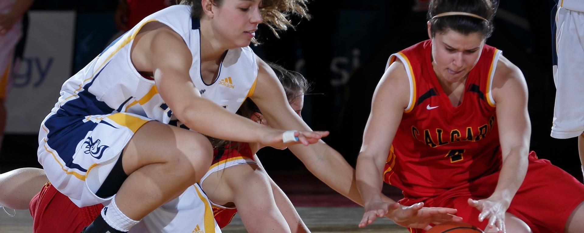 Dinos women's basketball team playing game
