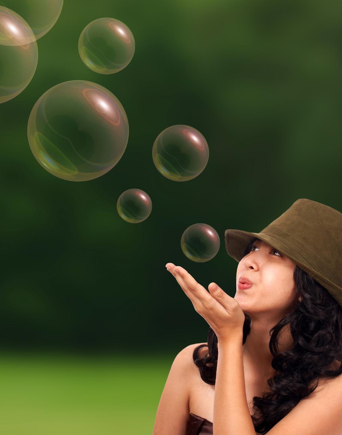 Woman blowing bubbles