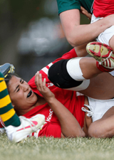 rugby player getting hit in the head