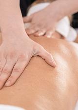 Person having their back massaged