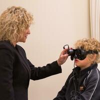 Child getting his eye sight tested